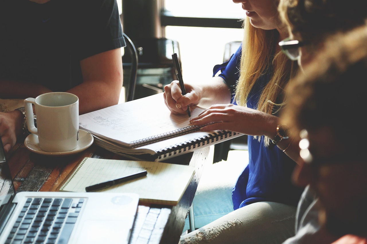 Professionals reviewing documents in an office